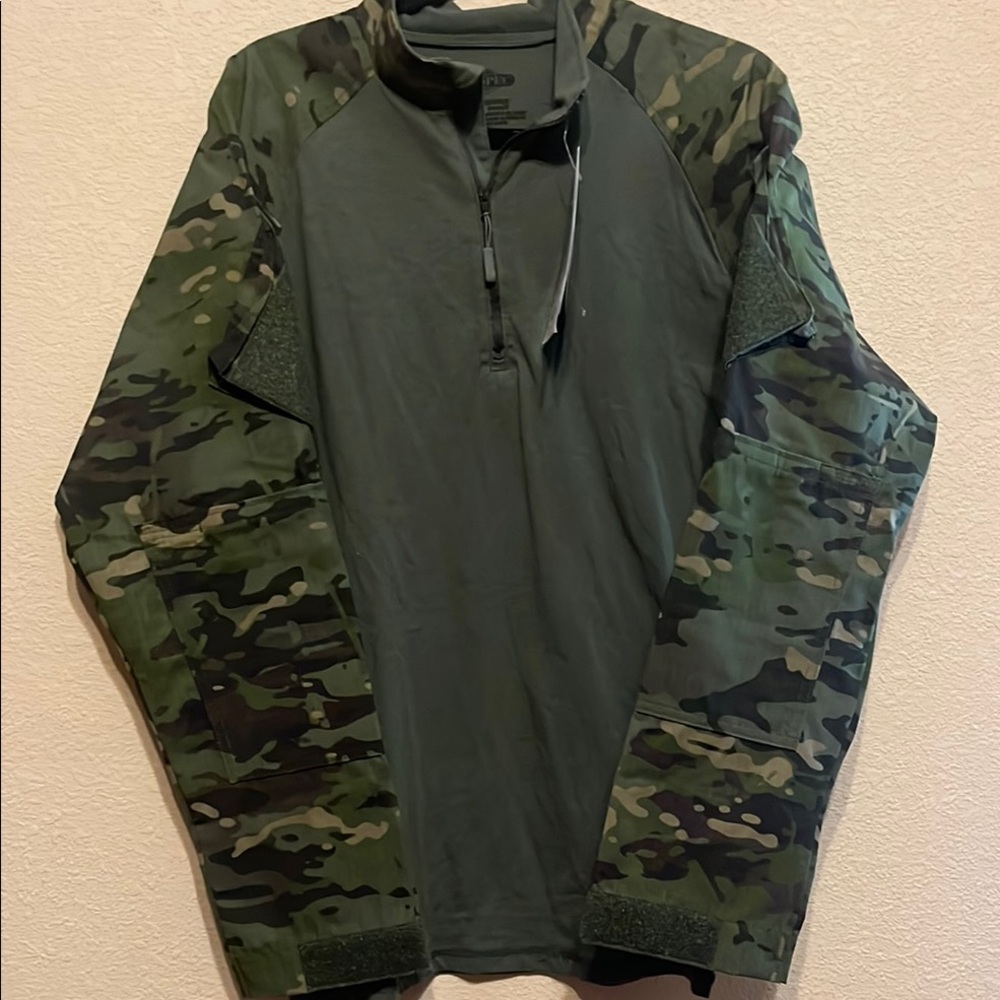 Tactical Response Uniform 1/4 Zip Combat Shirt.  New with tag. Size MENS M